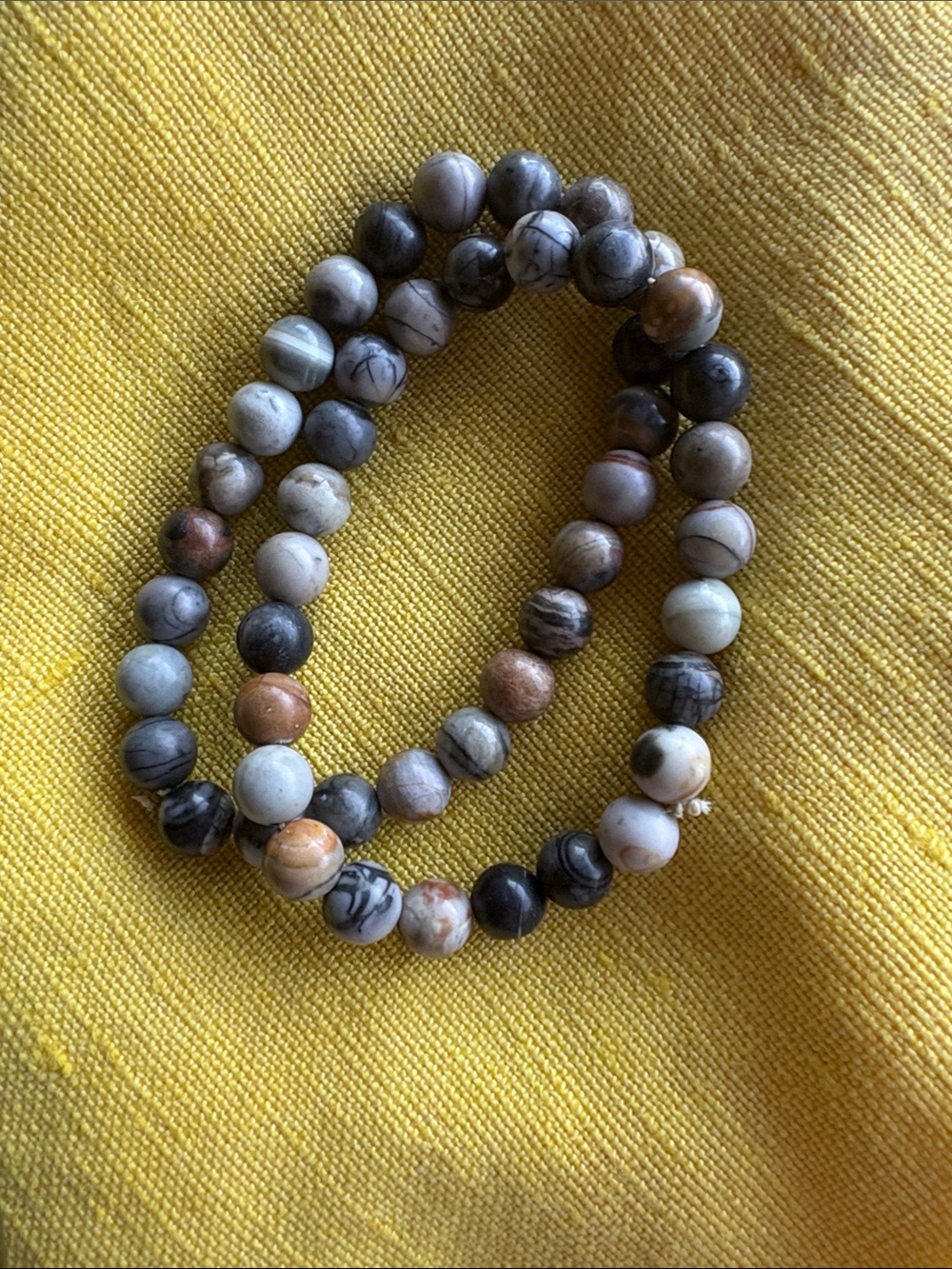 River Rock stretch rounded beaded bracelet. Double single. 5.5 in. Circumference